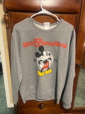 Disney Gray Mickey Mouse Graphic Sweatshirt with Red Logo and Yellow Accents